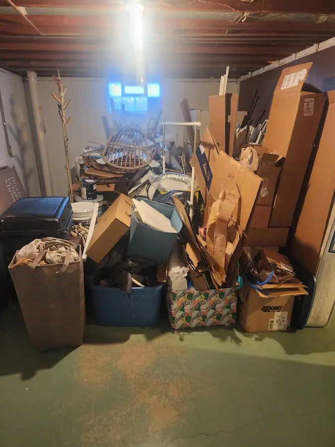 Roll-off dumpster container at job site for 2 Yard Dumpster Rental in West Brandywine